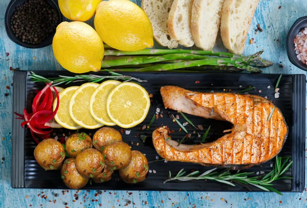 Dish of salmon and potatoe with lemon