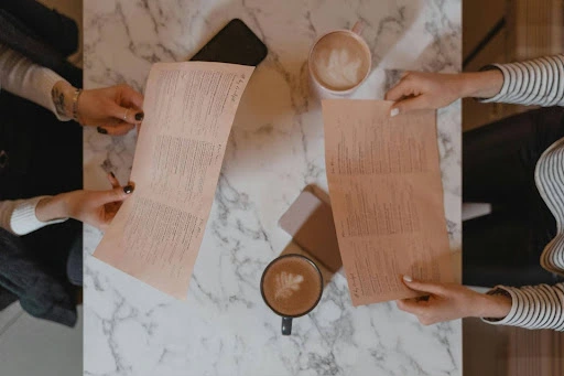Women reading a menu